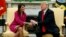 President Donald Trump meets with outgoing U.S. Ambassador to the United Nations Nikki Haley in the Oval Office of the White House, Oct. 9, 2018, in Washington. 