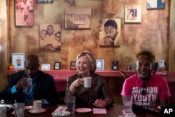 Democratic presidential candidate Hillary Clinton meets with African American community leaders at Mert's Heart & Soul in Charlotte, N.C., Oct. 2, 2016.