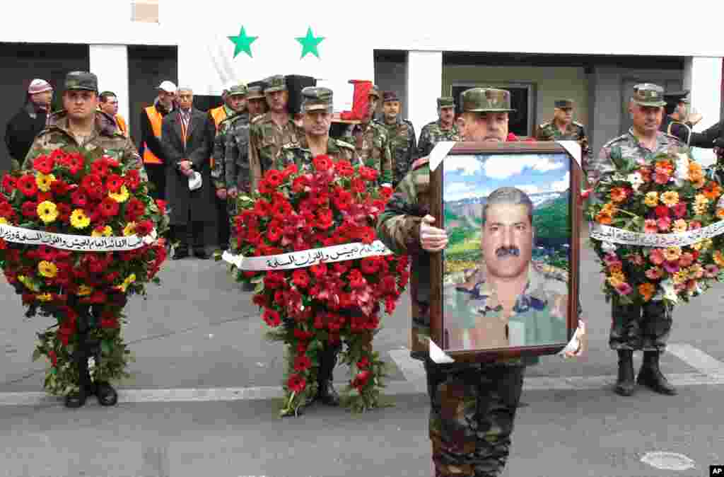 The funeral procession of Syrian General Mohammed al Awad Jan. 17, killed in Damascus on Monday. (E. Arrott/VOA)