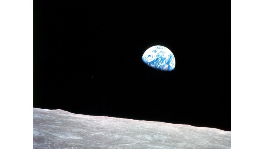 FILE - This image, called "Earthrise," is the first photograph of a distant blue Earth above the moon, taken by the Apollo 8 crew on Dec. 24, 1968.