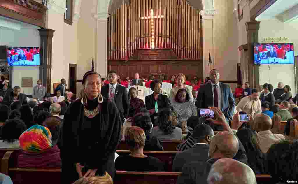 People turn their backs on Democratic U.S. presidential candidate Michael Bloomberg as he talks during a commemoration ceremony for the 55th anniversary of the &quot;Bloody Sunday&quot; march in the Brown AME Church in Selma, Alabama, March 1, 2020.