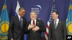 U.S. President Barack Obama, left, laughs with Kazakhstan President Nursultan Nazarbayev, center, and Russian President Dmitry Medvedev during their joint statement at the Nuclear Security Summit at the Coex Center, in Seoul, South Korea, Tuesday, March 2, 2012. (file) 