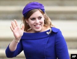 Britain's Princess Beatrice is pictured at the wedding of Princess Eugenie and Jack Brooksbank at St. George's Chapel in Windsor Castle, Oct. 12, 2018.