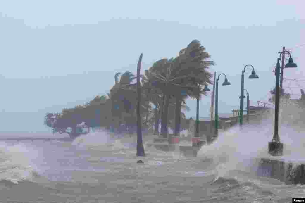 Waves crash against the seawall as Hurricane Irma slammed across islands in the northern Caribbean, in Fajardo, Puerto Rico, Sept. 6, 2017. 