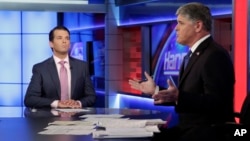 Donald Trump Jr. (L), is interviewed by host Sean Hannity on his Fox News Channel television program, in New York, July 11, 2017