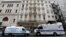 A New York Police Department truck and a City of New York Medical Examiner mobile lab park in front of 51 Park Place, April 29, 2013.