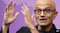 Microsoft CEO Satya Nadella speaks at an event at the Chatham House think tank in London, January 15, 2024. He will participate at the World Economic Forum annual meeting to discuss AI.