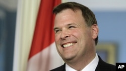 Canadian Foreign Minister John Baird, August 4, 2011 (file photo)