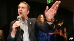 Virginia Gov. Ralph Northam speaks to supporters at a Democratic victory party in Richmond, Va., Tuesday, Nov. 5, 2019. All seats in the Virginia House of Delegates and State Senate are up for election.