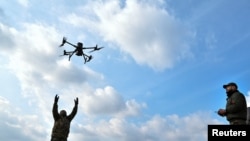 Ukrainian service members attend a training for using unmanned aerial vehicle (UAV), amid Russia's attack on Ukraine, in Zaporizhzhia region, Ukraine March 7, 2023. 