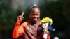 Gold medallist Peres Jepchirchir of Kenya celebrates on the podium REUTERS/Feline Lim