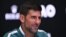 Novak Đoković na konferenciji za novinare u Melburnu (Foto: Lillian SUWANRUMPHA / AFP)