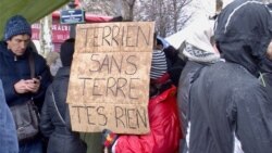 Paris climate protesters before France's rolling coronavirus lockdowns. (Lisa Bryant/VOA)