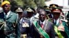 President Mugabe said apart from their security duties the armed forces were also transforming people’s lives through community services such as constructing schools and providing food aid. (Photo: VOA)
