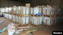 Electoral materials are stacked in a customs office after shipment from France in Bamako, Mali, June 18 2013. 