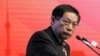 FILE - Ren Zhiqiang, the former chairman of state-owned property developer Huayuan Group, speaks at the China Public Welfare Forum in Beijing, Nov. 18, 2013. Ren who criticized the government's handling of the COVID-19 pandemic was jailed for 18 years on Sept. 22, 2020. 