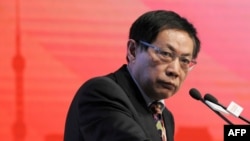 FILE - Ren Zhiqiang, the former chairman of state-owned property developer Huayuan Group, speaks at the China Public Welfare Forum in Beijing, Nov. 18, 2013. Ren who criticized the government's handling of the COVID-19 pandemic was jailed for 18 years on Sept. 22, 2020. 