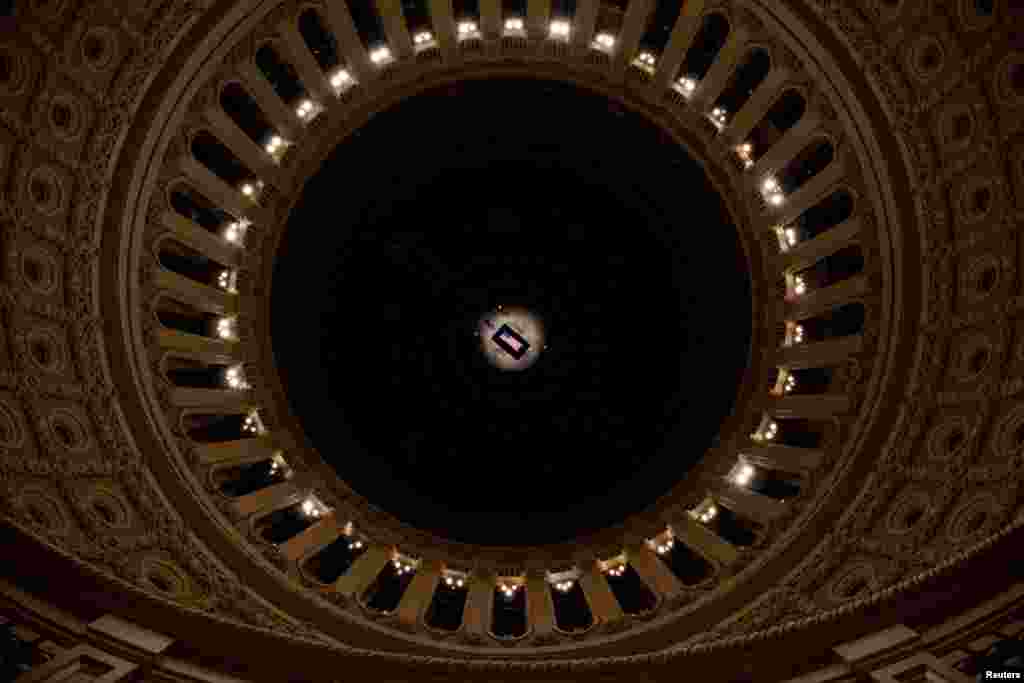 The flag-draped casket of former U.S. President Jimmy Carter lies in state in the U.S. Capitol Rotunda in Washington, Jan. 7, 2025. Andrew Harnik/Pool via REUTERS