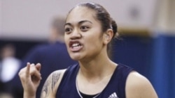 Easter Faafiti uses sign language to communicate with a teammate during practice by the women's basketball team at Gallaudet University in January