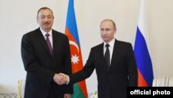 İlham Əliyev və Vladimir Putin (Arxiv foto. Mənbə: Azərbaycan Prezidentinin Administrasiyası)