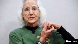 FILE - Debra Tice, mother of journalist Austin Tice who disappeared while reporting in Syria in 2012, holds a news conference at the National Press Club in Washington, May 2, 2023.