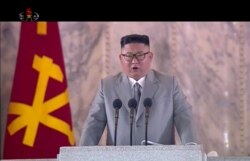 김정은 북한 국무위원장이 평양에서 지난 10일 열렸던 노동당 창건 75주년 기념 열병식에서 연설하고 있다.