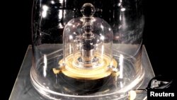 The International Prototype of the Kilogram (IPK) is pictured in Paris, France, in this undated photo obtained from social media, Nov. 12, 2018. 