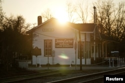 The sun sets over the railway depot that served as former U.S. President Jimmy Carter's 1976 presidential campaign headquarters in Plains, Georgia, on Jan. 3, 2025.