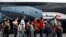 Central American migrants prepare to board a bus as they voluntarily return to their countries, in Ciudad Juarez, Mexico, July 2, 2019. 