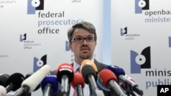 Belgian federal prosecutor Frederic Van Leeuw discusses the arrest of a suspect in the killings at a Belgian Jewish museum at the Federal Prosecutor's office in Brussels, June 1, 2014.