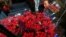 FILE - An employee organizes bouquets of flowers to be exported overseas, ahead of Valentine's Day, at Discovery Farm in Facatativa, Colombia, Feb. 8, 2018.