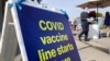 FILE - A sign is shown at a COVID-19 vaccine site in the Bayview neighborhood of San Francisco, Feb. 8, 2021. U.S. health officials worry Black Americans are lagging behind whites in getting vaccinated.