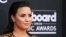 FILE - Demi Lovato arrives at the 2018 Billboard Music Awards, Las Vegas, Nevada, May 20, 2018. 