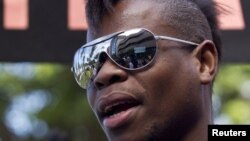 A man participates in Durban Pride parade where several hundred people marched through the Durban city center in support of gay rights. (File 2011)