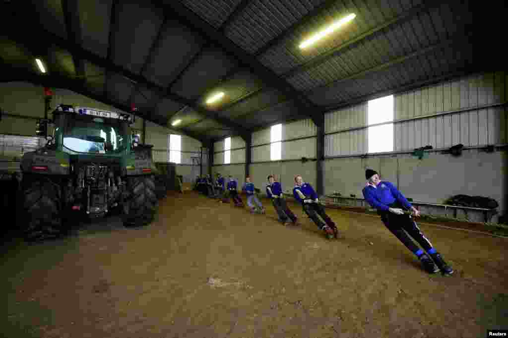 Tug of War champion and farmer James Kehoe, 63, of Boley Tug of War Club trains at home in his barn with teammates after being nominated as the &quot;greatest athlete of all time&quot; for the World Games awards, in County Tipperary village of Boley, Ireland, Jan. 27, 2021.