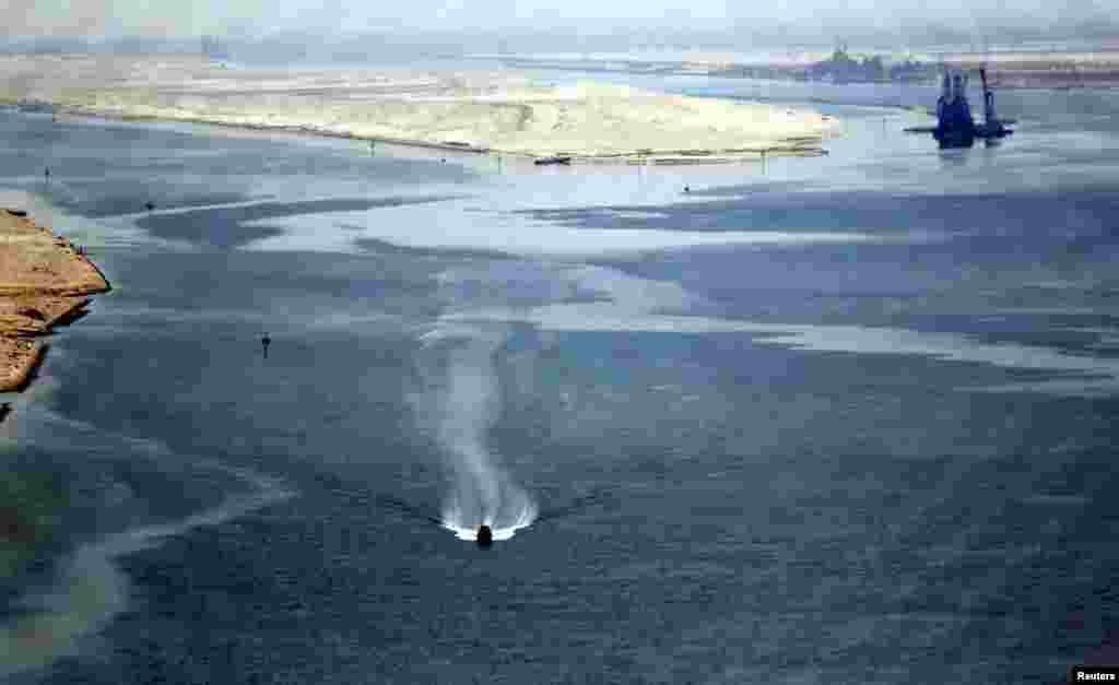 A general view of the Suez Canal is seen from al-Salam &quot;Peace&quot; bridge on the Ismalia desert road before the opening ceremony of the New Suez Canal, in Egypt, Aug. 6, 2015.