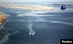 A general view of the Suez Canal is seen from al-Salam "Peace" bridge on the Ismalia desert road before the opening ceremony of the New Suez Canal, in Egypt, Aug. 6, 2015.