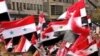 4 Killed in Syria's South, Massive Rally in North