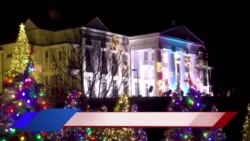 “假日路”装饰一新迎圣诞 七彩灯缤纷璀璨照夜空