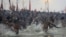 Indian Hindu holy men run naked into the water at Sangam, the confluence of the rivers Ganges, Yamuna and mythical Saraswati, during the royal bath at the start of the Kumbh Mela in Allahabad, India, Janaury 14, 2013.