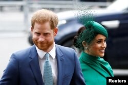 FILE -- Britain's Prince Harry and Meghan, Duchess of Sussex, arrive for the annual Commonwealth Service at Westminster Abbey in London, Britain, on March 9, 2020.