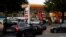 Vehicles queue to refill at a fuel station in London, Sept.30, 2021.