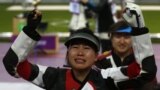 China's Yi Siling reacts after winning the women's 10m air rifle final competition at the London 2012 Olympic Games in the Royal Artillery Barracks at Woolwich in southeast London July 28, 2012.