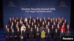 World leaders and attendees pose for a family photo during the Nuclear Security Summit in The Hague March 25, 2014. REUTERS