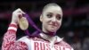 Pesenam Putri Rusia Mustafina Raih Emas Nomor Palang Bertingkat