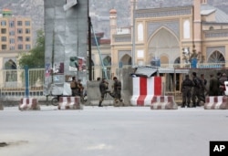 Afghan security forces responds to a Taliban-claimed suicide attack in Kabul, Afghanistan, Tuesday, April 19, 2016.