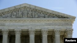 The U.S. Supreme Court is seen in Washington, March 29, 2016. The court on Tuesday split 4-4 for the first time in a major case since the death of Justice Antonin Scalia on a conservative legal challenge to a vital source of funds for organized labor, affirming a lower-court ruling that allowed California to force non-union workers to pay fees to public-employee unions.