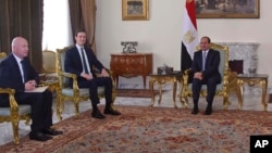 Egyptian President Abdel-Fattah el-Sissi, right, meets with President Donald Trump's son-in-law and senior adviser Jared Kushner, second left, and Middle East envoy Jason Greenblatt, left, June 21, 2018. Photo provided by Egypt's state news agency, MENA.