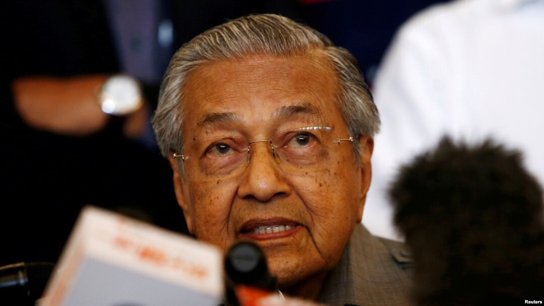 FILE - Mahathir Mohamad speaks during a news conference, Malaysia, May 10, 2018.