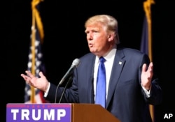 Kandidat calon presiden Partai Republik Donald Trump berbicara dalam kampanye di New Hampshire (19/8).